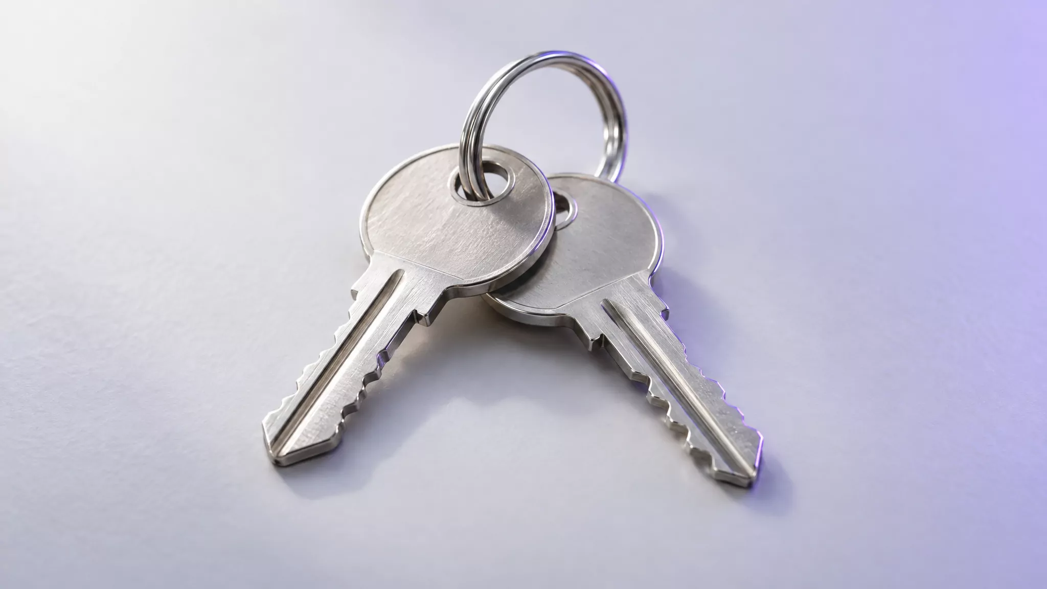 Two metal keys on one ring, standing for the Google updater that Chrome shares with other Google apps