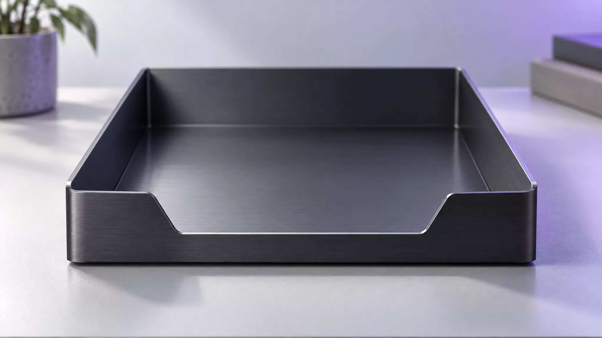Empty dark metal desk tray, standing in for a cleared Firefox profile folder after you remove Firefox from Mac